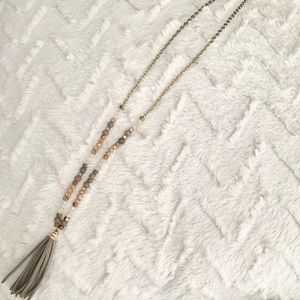Beaded necklace with gray tassle
